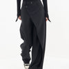 Pantalones anchos con botones asimétricos en la cintura