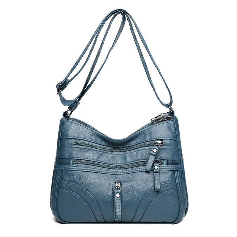 Clara - Bolso bandolera moderno con múltiples cremalleras y correa ajustable